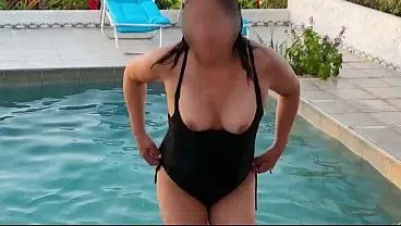 On vacation at the beach, I pull out my tits in public and my husband loves it.