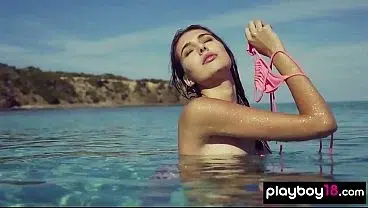 Skinny naked teen Katrina Pirs reveals her sweaty sun kissed pussy at beach