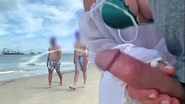 Crazy milf jerks me off in front of passersby