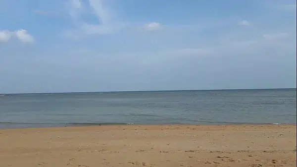 Slender beauty walks along the beach and swims in the sea. meet me