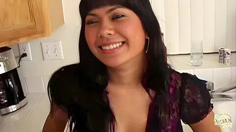 Sultry Asian Girl On The Kitchen Table Sticks A Large Black Cock In Her Constricted Pussy