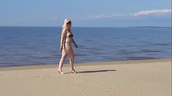 Mature beach slut invites guys to fuck her holes